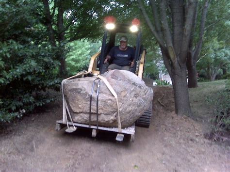 moving boulders with skid steer|How to Move Large Rocks Safely .